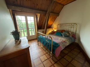 Cama o camas de una habitación en Chambre d'hôtes La Boursicauderie