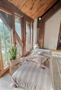 Cama o camas de una habitación en Chambre d'hôtes La Boursicauderie