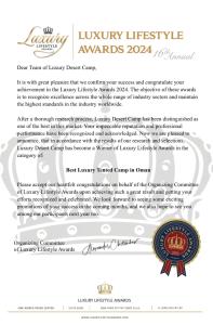 a letter of invitation to the luxury lifestyle awards at Luxury Desert Camp in Al Wāşil