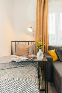 Postel nebo postele na pokoji v ubytování GoodLife Studio Apartment