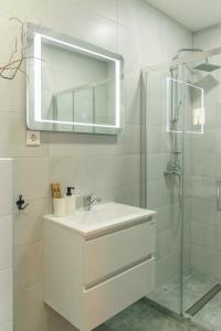Koupelna v ubytování GoodLife Studio Apartment + 21 fotografií