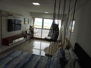 TV a/nebo společenská místnost v ubytování Flat Pé na Areia, Recife-Piedade