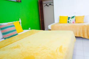 Letto o letti in una camera di AYURVEDA RESORT