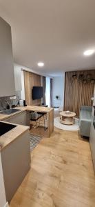 Køkken eller tekøkken på Apartmán GIGI Rezort Linea