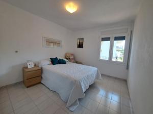 Ένα ή περισσότερα κρεβάτια σε δωμάτιο στο Apartament Empordanet +16 φωτογραφίες