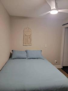 a white bed in a room with a ceiling at Hidden Oasis Near Safari - Wineries - Lakes in Escondido +36 photos