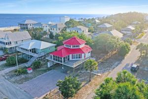 an aerial view of a house with a red roof at DeLight House by Pristine Properties Vacation Rentals in Indian Pass