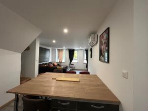 Posezení v ubytování Appart Pro & Famille