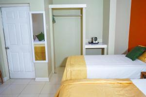 Letto o letti in una camera di AYURVEDA RESORT