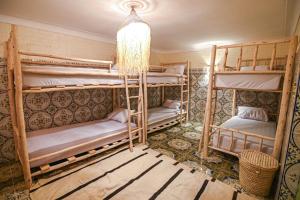Postel nebo postele na pokoji v ubytování Oasis Medina Hostel