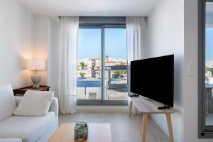 Μια τηλεόραση ή/και κέντρο ψυχαγωγίας στο Apartamento Pachimon