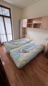 Postel nebo postele na pokoji v ubytování Grott Di Baloi