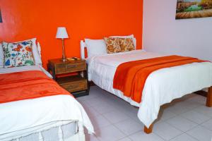 Letto o letti in una camera di AYURVEDA RESORT