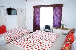 Letto o letti in una camera di AYURVEDA RESORT