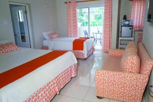 Letto o letti in una camera di AYURVEDA RESORT