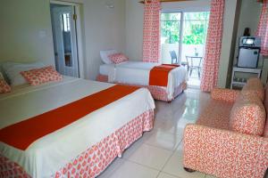 Letto o letti in una camera di AYURVEDA RESORT