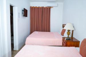Letto o letti in una camera di AYURVEDA RESORT