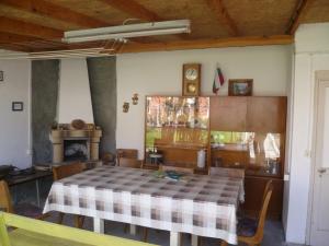 a dining room with a table and some chairs at Stai Za Gosti Venera in Hisarya