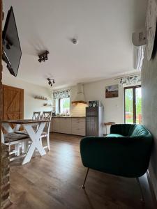 Kuchnia lub aneks kuchenny w obiekcie Apartamenty Komarno 46 Jacuzzi&Sauna