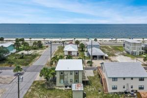 an aerial view of a beach with houses and the ocean at Beach View Lower by Pristine Properties Vacation Rentals in Mexico Beach