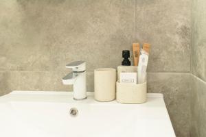 Ένα μπάνιο στο GoodLife Deluxe Apartment
