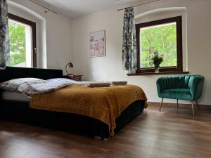 Łóżko lub łóżka w pokoju w obiekcie Apartamenty Komarno 46 Jacuzzi&Sauna