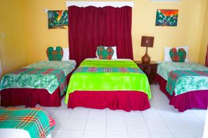 Letto o letti in una camera di AYURVEDA RESORT
