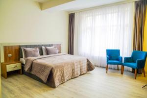 Postel nebo postele na pokoji v ubytování Zengezur Harmony Wellness Resort