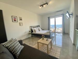 a living room with a couch and a table at Apartments Dolores in Senj