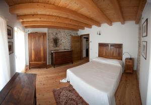 Postel nebo postele na pokoji v ubytování B&B La Valle dell'Albero