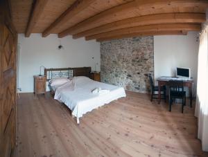 Postel nebo postele na pokoji v ubytování B&B La Valle dell'Albero