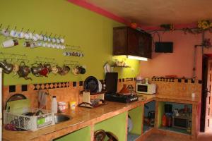 Кухня или мини-кухня в DAR MOHA
