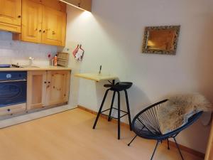 Η κουζίνα ή μικρή κουζίνα στο Superbe appartement au centre de la station