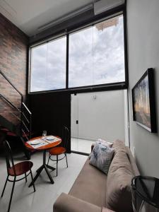Μια τηλεόραση ή/και κέντρο ψυχαγωγίας στο Loft Aconchego de Beija