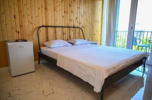Postel nebo postele na pokoji v ubytování Alis House 3