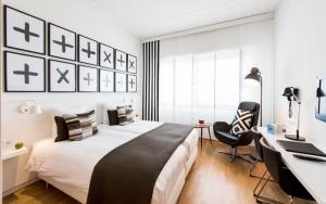 Postel nebo postele na pokoji v ubytování WestCord Hotel Delft