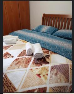 Postel nebo postele na pokoji v ubytování Apartmani "Matija"