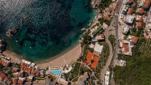 an aerial view of a beach and the ocean at Apartments Raymond in Sveti Stefan
