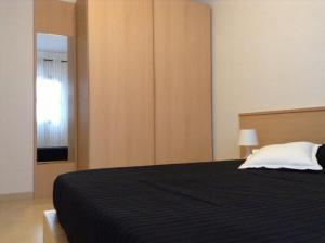 Ένα ή περισσότερα κρεβάτια σε δωμάτιο στο Casa Carlotta Lajares