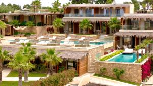 an aerial view of a resort with a swimming pool at SANIMAR By Mono Alex in Kassandra