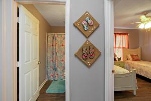 a door to a room with a room with a bedroom at The Lighthouse by Pristine Properties Vacation Rentals in Saint Joe Beach