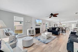 TV a/nebo společenská místnost v ubytování Bear Point Cottage + 31 fotografií