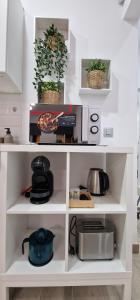 Kuchyň nebo kuchyňský kout v ubytování La Belle Home