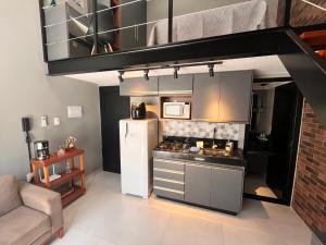Η κουζίνα ή μικρή κουζίνα στο Loft Aconchego de Beija
