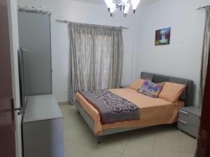 Giường trong phòng chung tại Amwaj north coast +35 ảnh