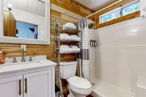 a bathroom with a toilet and a sink and a shower at The Venado House in Arnold +17 photos