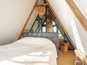 Postel nebo postele na pokoji v ubytování De Bonte Specht