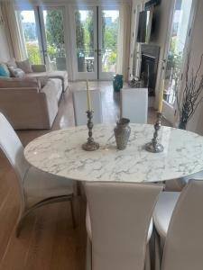 a living room with a table with two candles on it at Elegant Apartment - central location in Los Angeles +36 photos