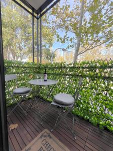 a table and two chairs on a wooden deck at 2BDR 1BTH 1PRK - James Jem in Perth