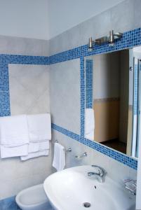 Koupelna v ubytování Hotel del Centro
